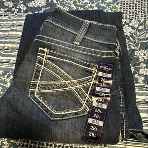 Brand new with adhesive tag attached women’s Ariat mid rise boot cut jeans 28s